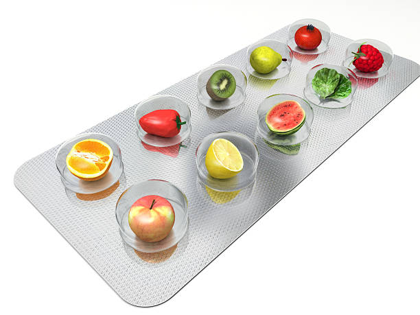 천연 비타민 환약 - capsule vitamin pill red orange 뉴스 사진 이미지