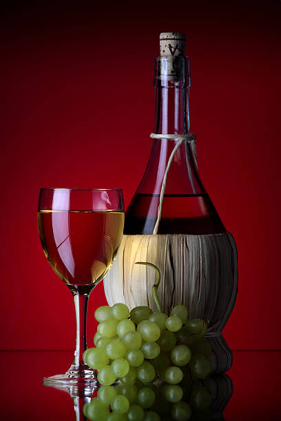 wine glass and grapes stock photo