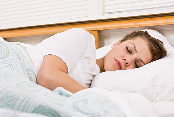 istock Beautiful Woman Sleeping 151555943
