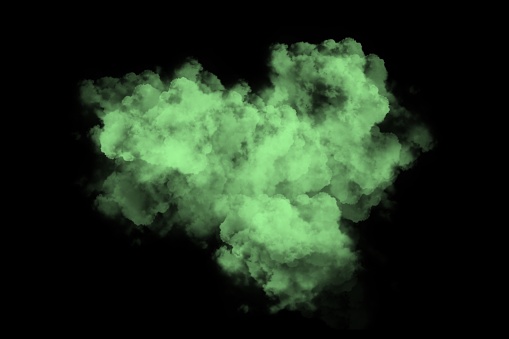 a green Smoke spreading on dark background