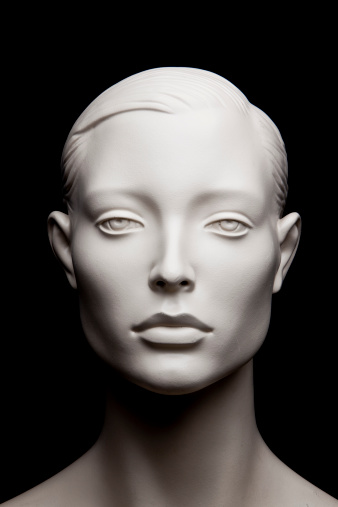 Mannequin head before black background