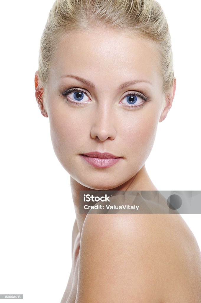 Face of beautiful caucasian blonde woman Close-up face of beautiful caucasian blonde woman with blue eyes over white 20-29 Years Stock Photo