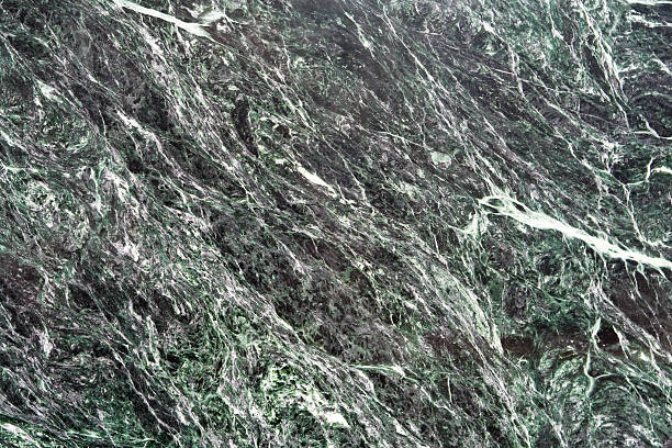 istock Full Frame Close-Up of  Polished Black Green Metamorphic Rock Surface 151559491