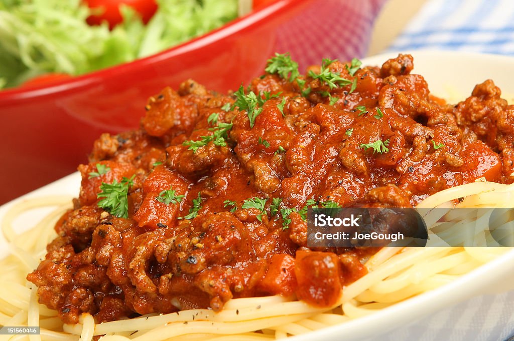 Spaghetti Bolognese Spaghetti bolognaise with salad Beef Stock Photo