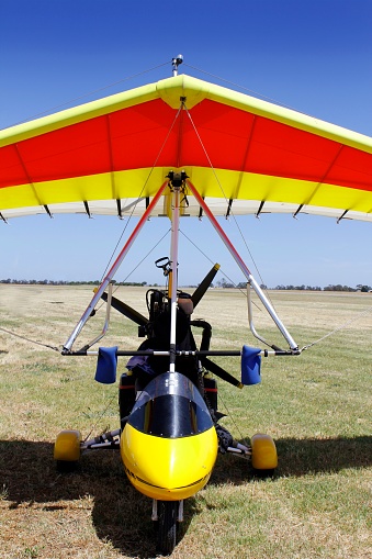 Powered hang glider on the airfield, waiting for a flight