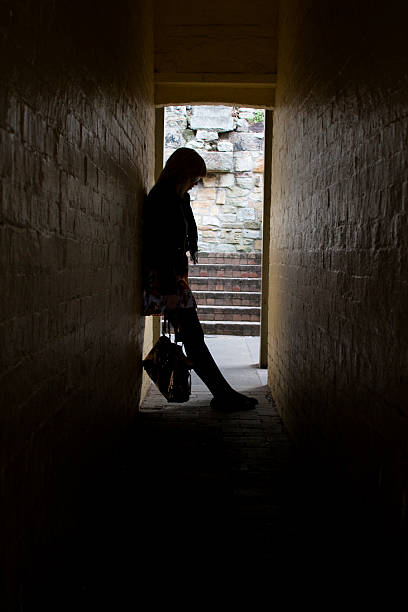 istock Woman Leaning against Wall 151566837