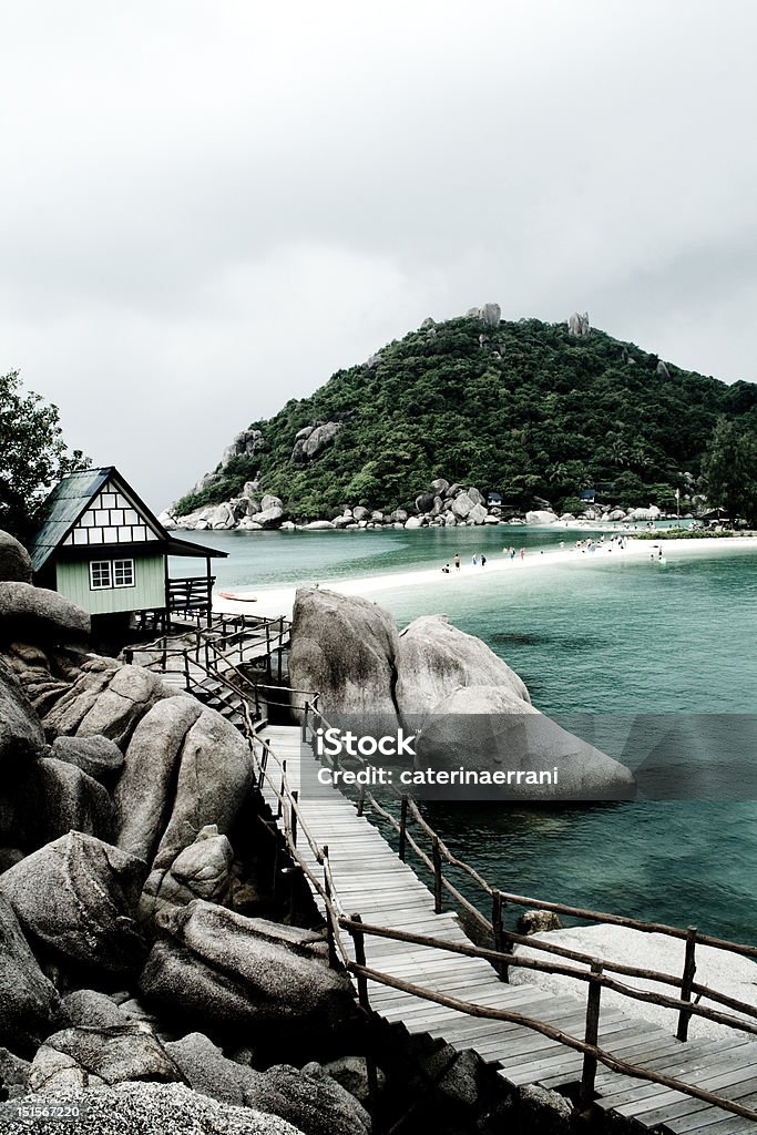 Pie en la isla de madera - Foto de stock de Andar libre de derechos