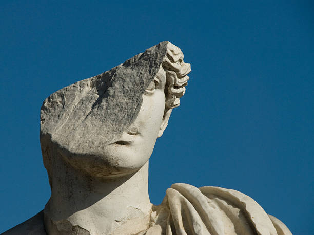 Roman Ruins - Ancient Host A damaged statue in Ostia Antica statue stock pictures, royalty-free photos & images
