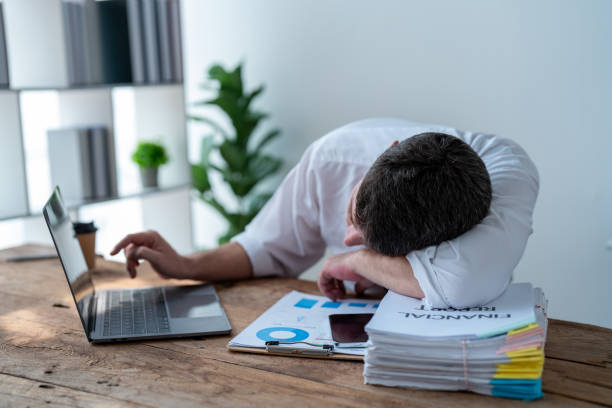 istock A office man feel tired low energy with overworking 1515694193