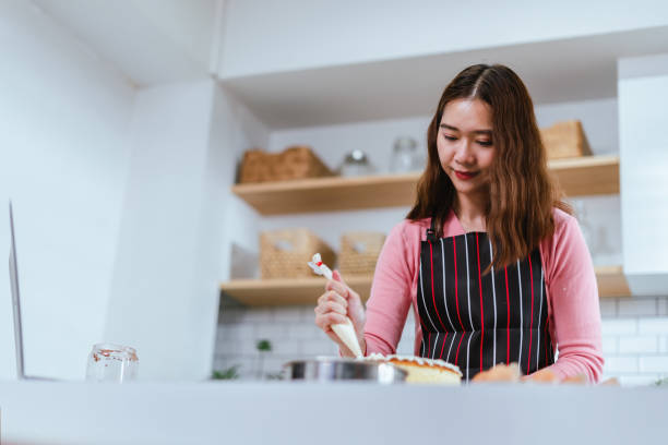 istock Culinary Passion Unleashed, Woman's Artistic Cake Making and Decoration as a Lifestyle Hobby 1515697118