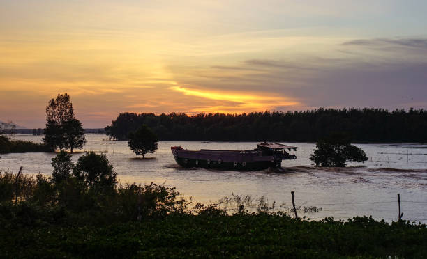 Sunset on Mekong River in An Giang, Southern Vietnam.