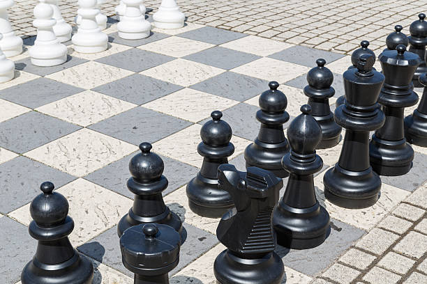 istock Outdoor chess board with big  plastic pieces 151570427