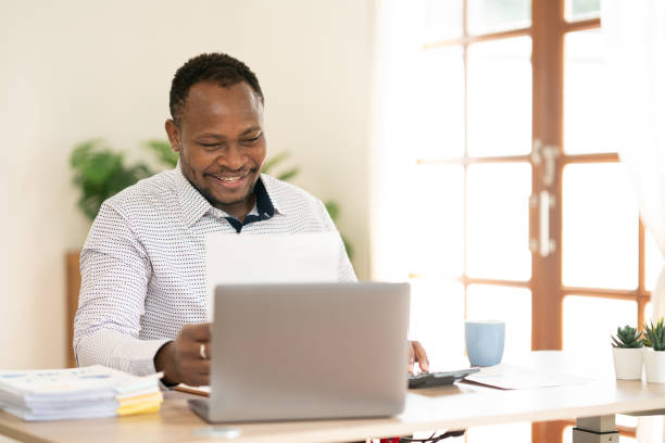 A businessman happy work while  sitting in the friendly environment at work