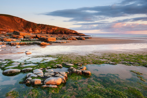Colorful sunset over Dunraven Bay, Southerdown, Wales. XL image size, left unsharpened.
