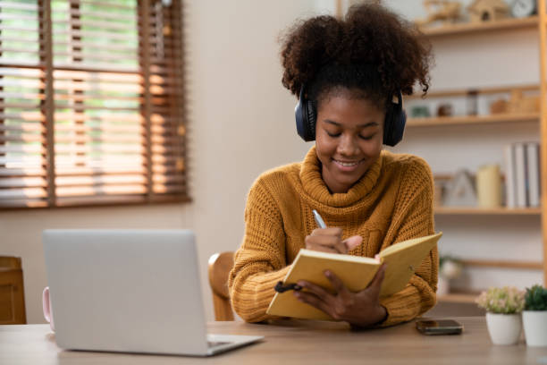 istock Online training, young woman listening lectures in online class 1515722287