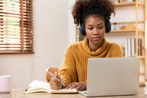 istock Young woman student interactive with teacher in online classroom, virtual lectures, virtual discussion, face- to- face video workshop, Online video calls, meeting and conferencing with teammate 1515722989
