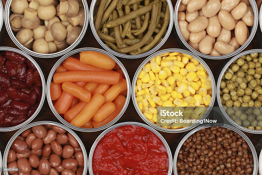 Vegetables in cans Different kinds of vegetables such as corn, peas and tomatoes in cans Canned Food Stock Photo