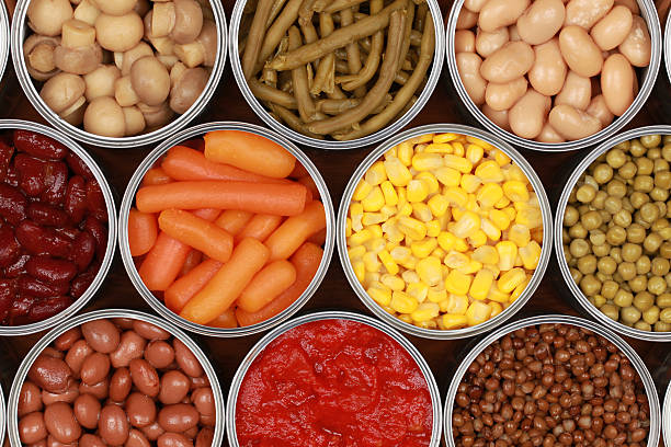 Vegetables in cans Different kinds of vegetables such as corn, peas and tomatoes in cans preserved stock pictures, royalty-free photos & images