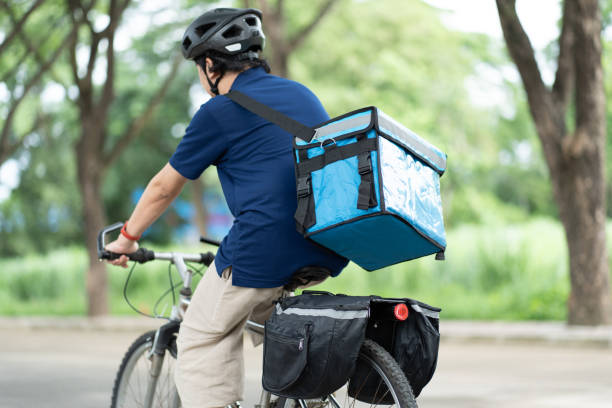 istock Delivery food by bicycle courier thermal box 1515760800