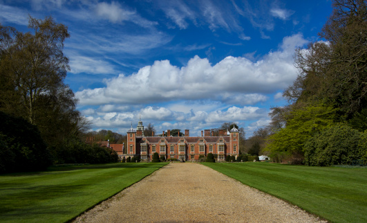 This image emphasises the dramatic nature and vital history of this imposing Jacobean manor house. Blickling Hall in Norfolk, UK, was the residence and possible birthplace of Anne Boleyn.