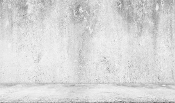 istock background and concrete backdrop and cement shelf showing products in black and gray , empty studio interior and with empty messages background. 1515768087