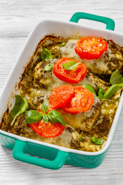 istock chicken breasts with pesto sauce, cheese, tomato 1515787857