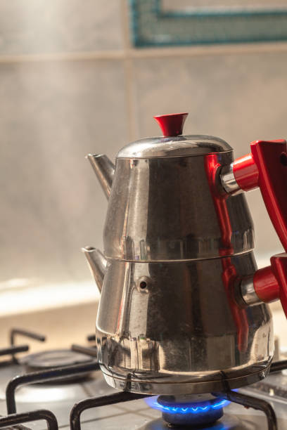 istock teapot on the stove 1515824208