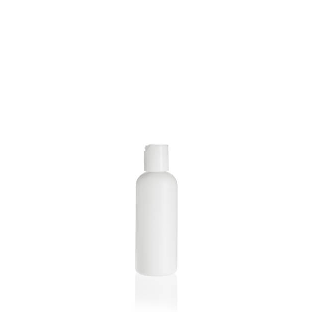 istock White cylindrical medium PEHD bottle container with white plastic cap on white background. Template of a bottle for cosmetics and medical products. 1515839828