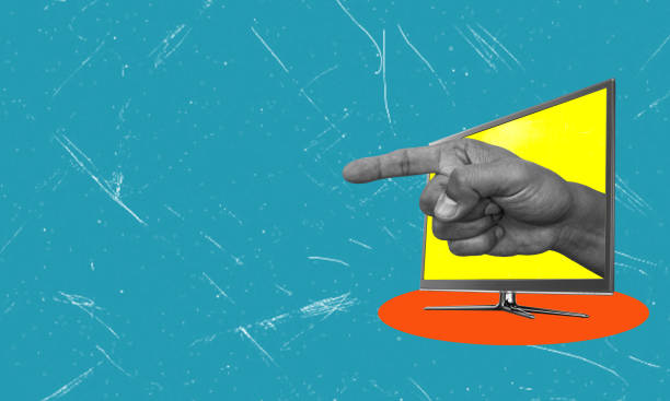 istock Abstract art collage, digital collage, finger pointing from a modern TV on a blue background with copy spaces. 1515843098