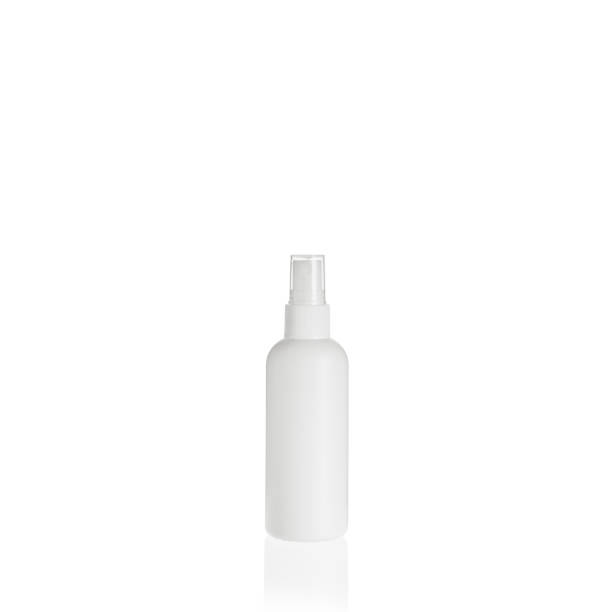 istock White cylindrical medium PEHD bottle container with spray pump on white background. Packaging of antiseptic. Template of a bottle for cosmetics and medical products. 1515844659
