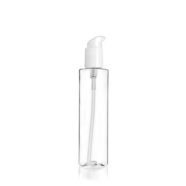 istock Transparent cylindrical PET bottle container with white lotion pump. Packaging of antiseptic. Template of a bottle for cosmetics and medical products. Isolated on white background, copy space template, banner. 1515854152