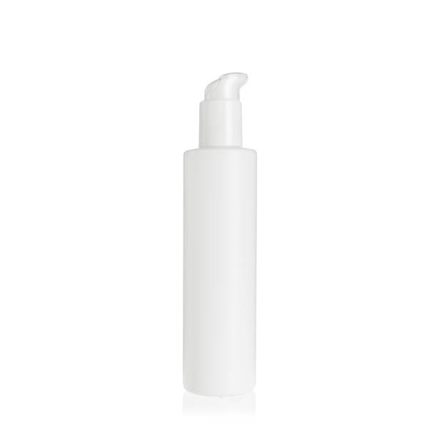 istock White cylindrical PEHD bottle container with white lotion pump. Packaging of antiseptic. Template of a bottle for cosmetics and medical products. Isolated on white background, copy space template, banner. 1515858354
