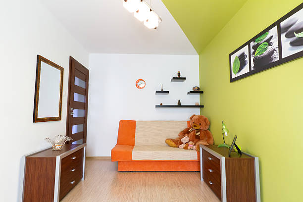 istock White and green bedroom 151587572
