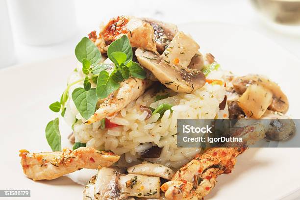 Risotto With Mushrooms And Chicken Meat Stock Photo - Download Image Now - Chicken Meat, Chinese Food, Cooked