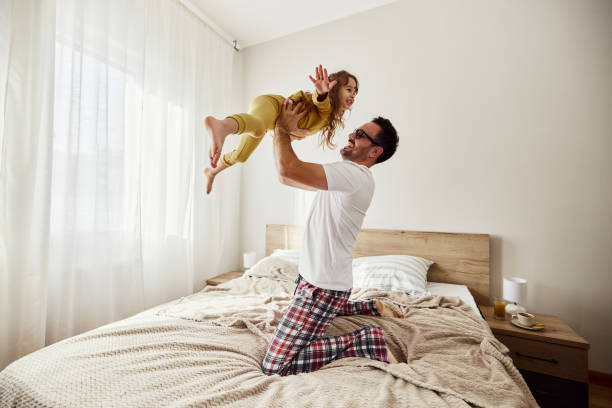 istock Daddy, I'm flying like an airplane! 1515884450