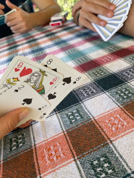 istock Friends time, card playing, funny time 1515915587