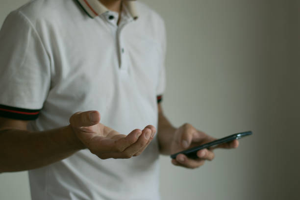 istock discussing work and contemplating work Men are using mobile phones, smartphones, chatting 1515932540