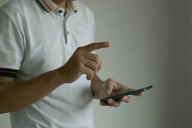 istock Men are using mobile phones, smartphones, chatting, discussing work and contemplating work 1515933049