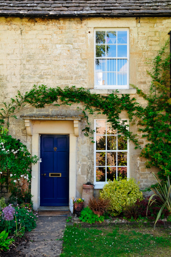 Exterior and Garden of an Old English Stone Cottage