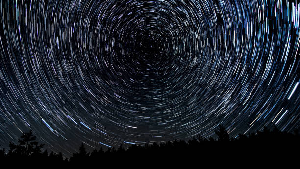 istock Star trails in the night sky 1516006466