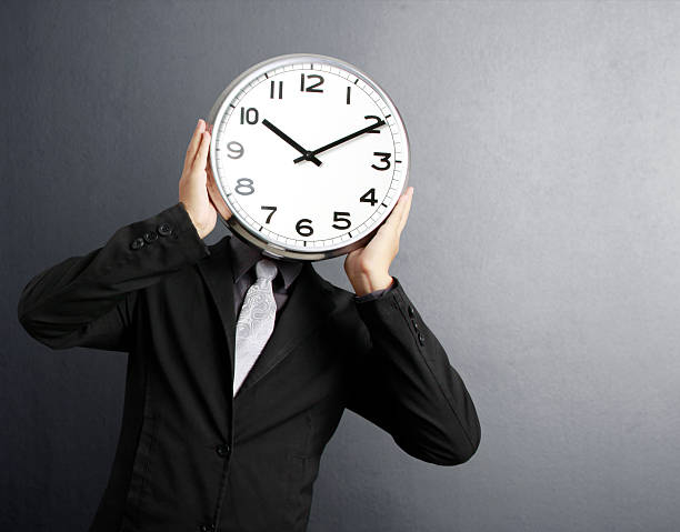 istock Businessman with alarm clock head 151602023