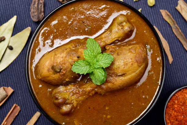 istock Indian style spicy chicken curry top view 1516042678