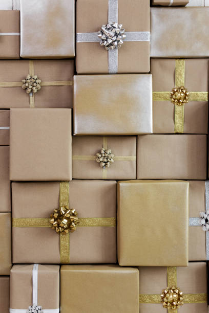 istock Flatlay of brown gift boxes with ribbons and bows 1516072328
