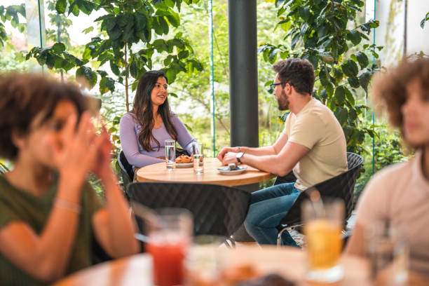 istock Lovely Hispanic Couple Enjoying Artisan Coffee 1516105294