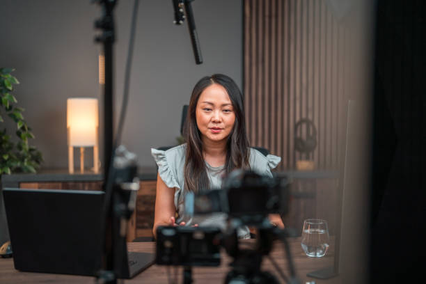 istock Asian Content Creator Mastering the Art of Recording Studio 1516113071