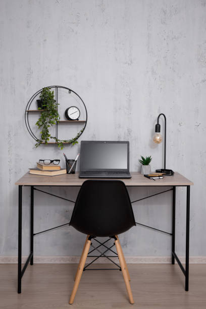 istock Workplace with laptop in office or home 1516133816