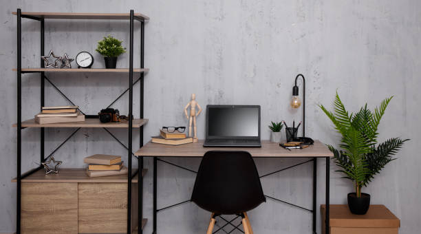 istock business and computers concept - room with shelf and table over concrete wall 1516133893