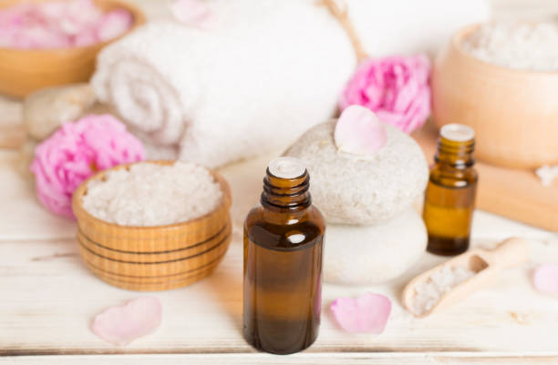istock Spa composition with pink roses on wooden table 1516135021