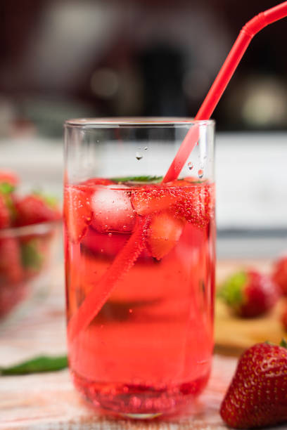 istock Summer refreshing cocktail with strawberries and fresh mint and ice cubes. Close-up. Selective focus. 1516140517