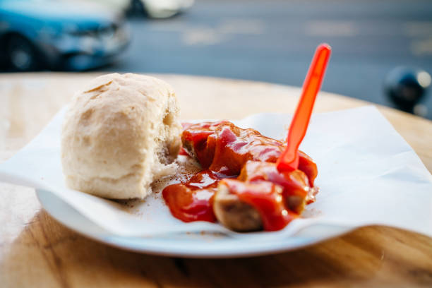 Berlin Currywurst, german dish of sliced sausage with a fresh bun